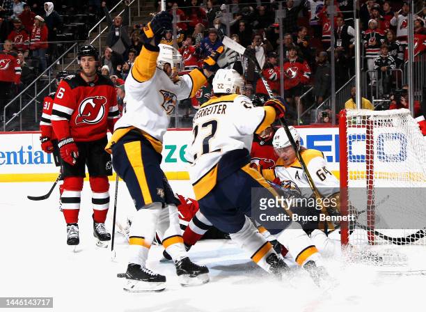 Mikael Granlund of the Nashville Predators ties the score at 19:51 of the third period against the New Jersey Devils at the Prudential Center on...