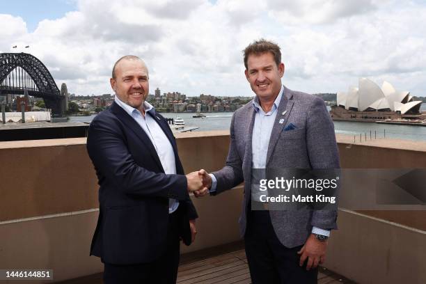 Rugby Australia CEO Andy Marinos and New Zealand Rugby CEO Mark Robinson shake hands during a Super Rugby media announcement by Rugby Australia and...