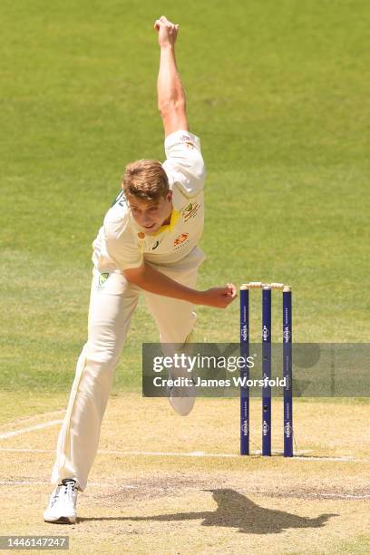 Cameron Green of Australia follows through after his bowl during day three of the First Test match between Australia and the West Indies at Optus...