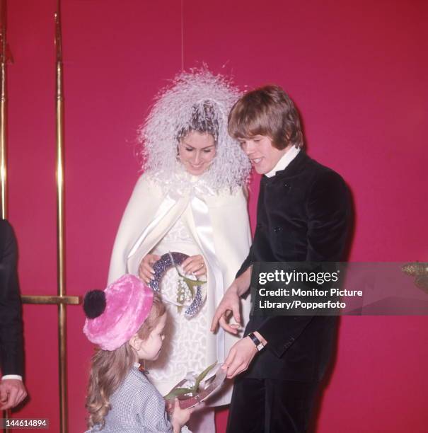 Peter Noone of UK pop group Hermans Hermits photographed at his wedding to Mireille Strasser in 1967.;