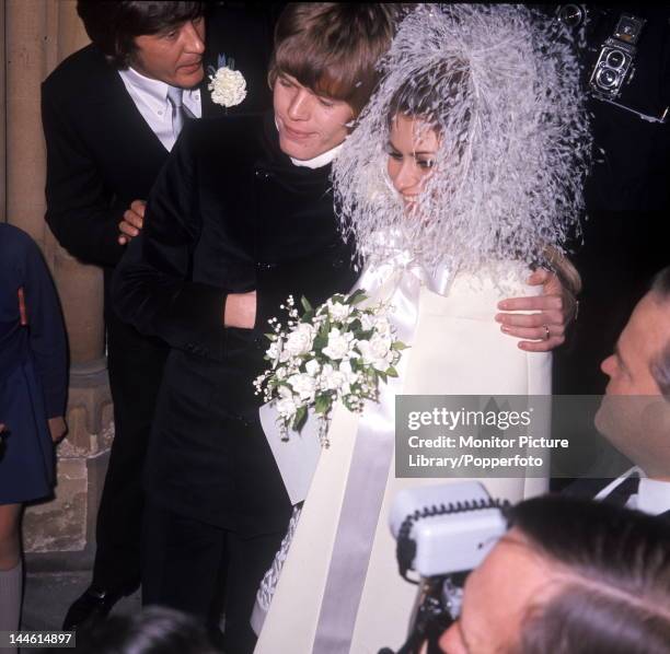 Peter Noone of UK pop group Hermans Hermits photographed at his wedding to Mireille Strasser in 1967.;