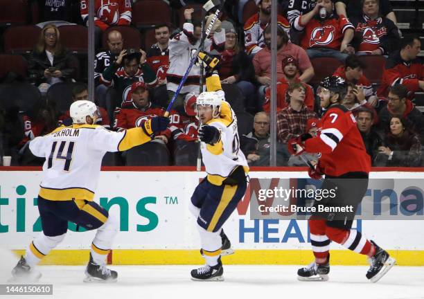 Ryan Johansen of the Nashville Predators scores at 33 seconds of overtime to defeat the New Jersey Devils 4-3 at the Prudential Center on December...