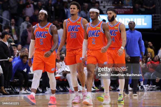 Luguentz Dort, Jeremiah Robinson-Earl, Shai Gilgeous-Alexander and Kenrich Williams of the Oklahoma City Thunder reacts during a game against the New...