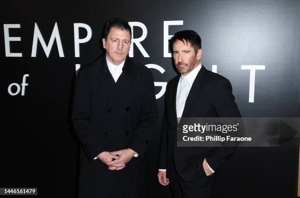 Atticus Ross and Trent Reznor attend the Los Angeles premiere of Searchlight Pictures "Empire of Light" at Samuel Goldwyn Theater on December 01,...