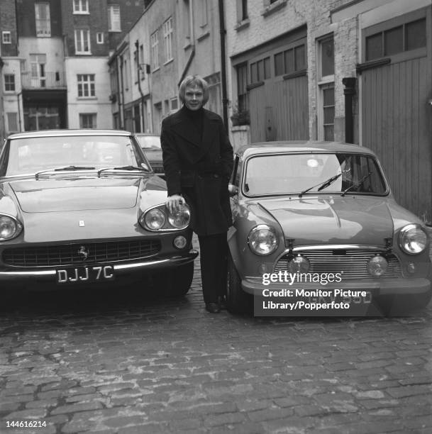 Colin Petersen with his cars, a Ferrari and Mini.; March 1969;