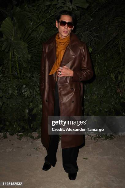 Evan Mock attends the Saint Laurent Art Basel Miami Beach Party on December 01, 2022 in Miami Beach, Florida.