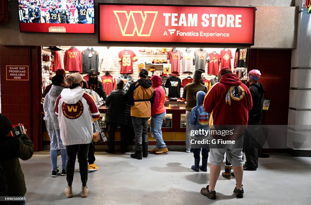 Commanders Target Store Fans line up at the Washington Commanders team store before the game ...