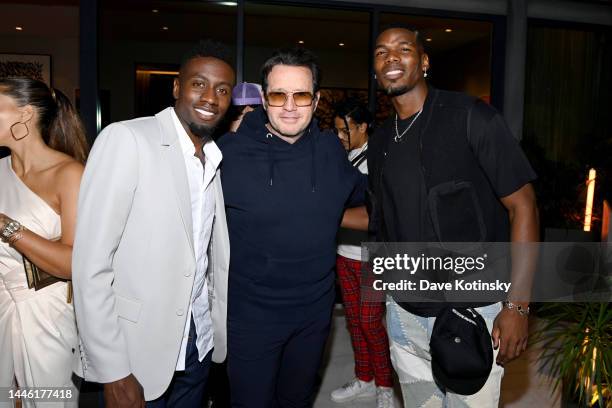 Blaise Matuidi, François Henry-Bennahmias and Paul Pogba attend Audemars Piguet 2022 Art Basel Event with Zack Bia on December 01, 2022 in Miami,...