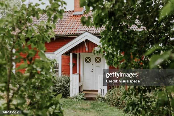 red traditional nordic summer cottage - house sweden stock pictures, royalty-free photos & images