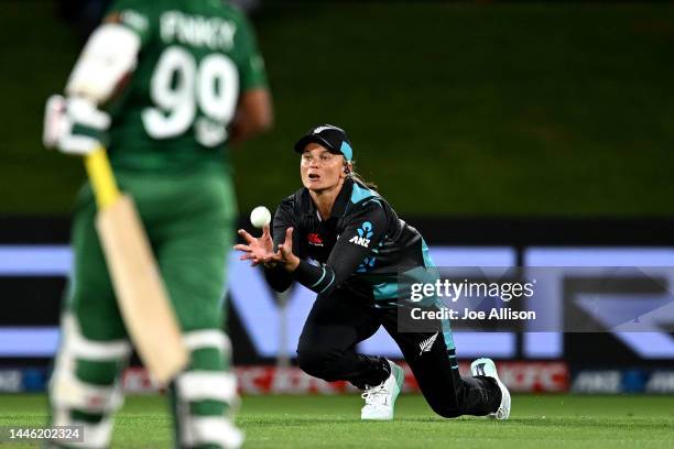 Suzie Bates of New Zealand catches the wicket of Fargana Hoque Pinky during the first T20 International match in the series between New Zealand White...