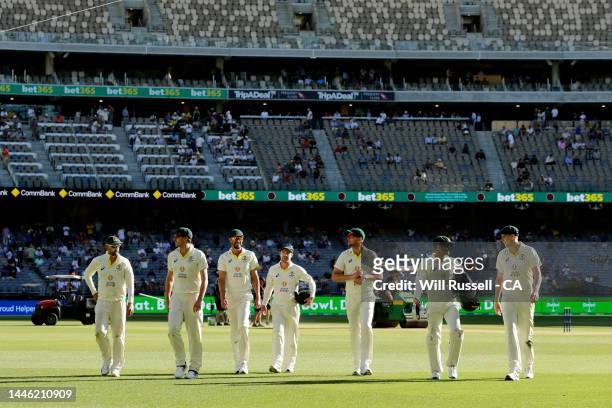 Team Australia leave the field after dismissing the Windies for 283 during day three of the First Test match between Australia and the West Indies at...