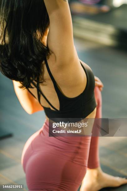 young asian yoga instructor, practicing yoga in the morning - pranayama stock pictures, royalty-free photos & images