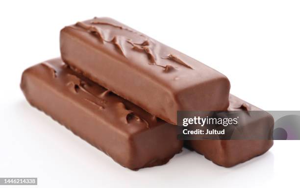 three small chocolate bars, isolated in white - chocolate bar stock pictures, royalty-free photos & images