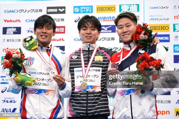 Silver medalist Shuya Matsumoto of Japan, gold medalist Daiki Yanagawa of Japan and bronze medalist Rikuya Kawabata of Japan pose during the medal...