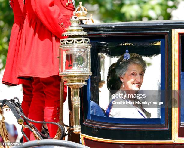 Lady Susan Hussey travels down The Mall in a horse drawn carriage to attend the State Opening of Parliament on May 27, 2015 in London, England.