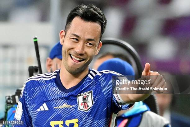 Maya Yoshida of Japan thumbs up after their 2-1 victory and qualification to the knockout stage after the FIFA World Cup Qatar 2022 Group E match...
