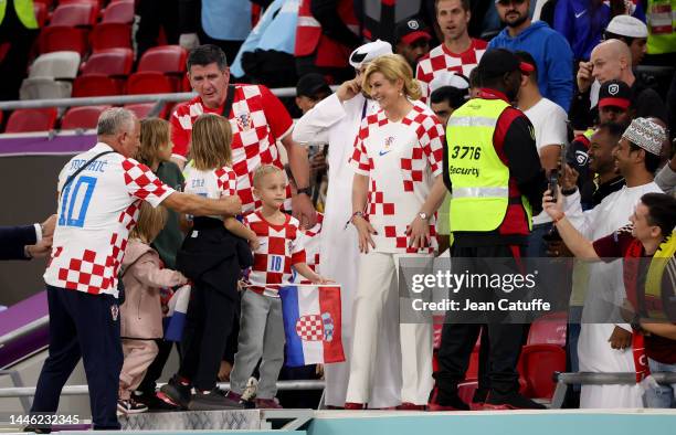 Former President of Croatia Kolinda Grabar-Kitarovic celebrates the victory following the FIFA World Cup Qatar 2022 Group F match between Croatia and...
