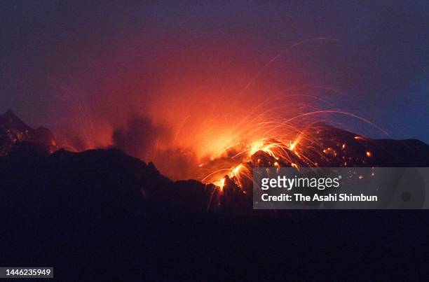 In this long exposure image, Mt. Sakurajima erupts on December 2, 2022 in Kagoshima, Japan.