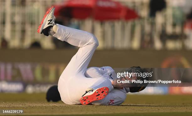 Keaton Jennings of England reacts after dropping a catch from the bat of Abdullah Shafique during the second day of the first Test between Pakistan...