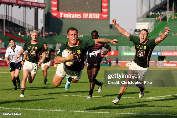 James Murphy of South Africa celebrates teammate Ricardo Duarttee scoring a try during the match between South Africa and Kenya on day one of the...