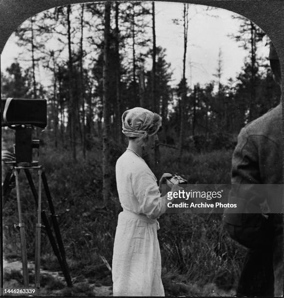 Belgian Royal Elisabeth of Bavaria, Queen of the Belgians taking photographs during the visit of the US President to Adinkerke, Belgium, 18th June...