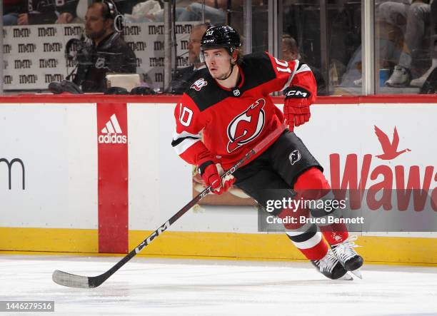 Alexander Holtz of the New Jersey Devils skates against the Nashville Predators at the Prudential Center on December 01, 2022 in Newark, New Jersey....