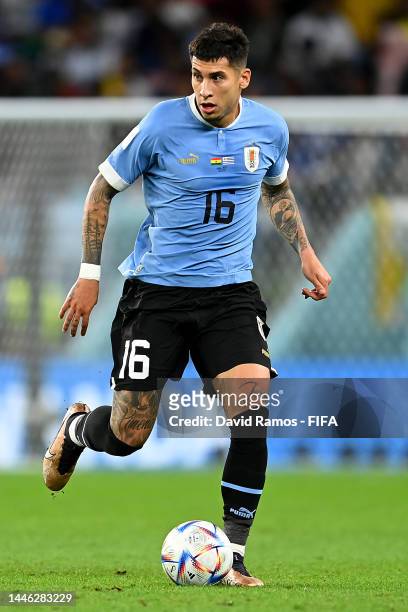 Mathias Olivera of Uruguay in action during the FIFA World Cup Qatar 2022 Group H match between Ghana and Uruguay at Al Janoub Stadium on December...