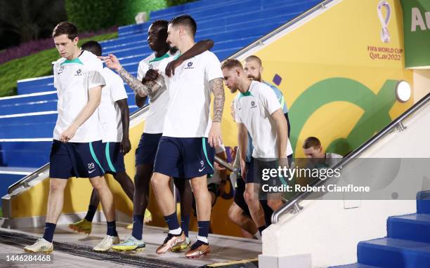 Craig Goodwin of Australia takes to the field with teammates during Australia Training Session ahead of their Round of Sixteen match against...