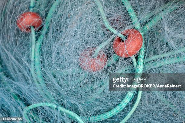 fishing net with floats and ropes, cyprus - fishnet stockings bildbanksfoton och bilder