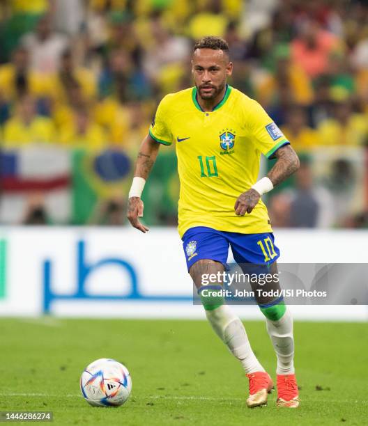 Neymar of Brazil dribbles the ball during a FIFA World Cup Qatar 2022 Group G match between Serbia and Brazil at Lusail Stadium on November 24, 2022...