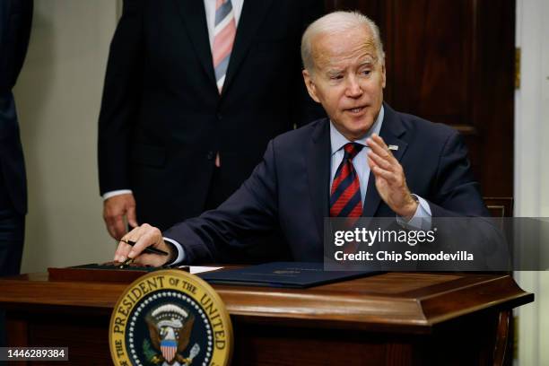 President Joe Biden speaks after signing bipartisan legislation averting a rail workers strike in the Roosevelt Room at the White House on December...