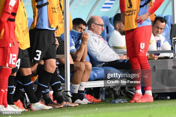 Luis Suarez of Uruguay is seen on the bench during the FIFA World Cup Qatar 2022 Group H match between Ghana and Uruguay at Al Janoub Stadium on...