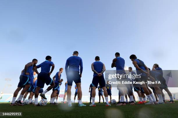 Steve Holland, Assistant Head Coach and Gareth Southgate, Head Coach of England, talk to players during a training session at Al Wakrah Stadium on...