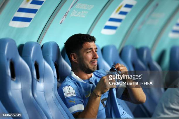 Luis Suarez of Uruguay shows dejection after the team fails to qualify for the knockout stage despite their 2-0 victory in the FIFA World Cup Qatar...