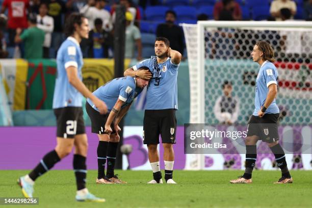 Luis Suarez of Uruguay looks dejected after their sides' elimination from the tournament during the FIFA World Cup Qatar 2022 Group H match between...