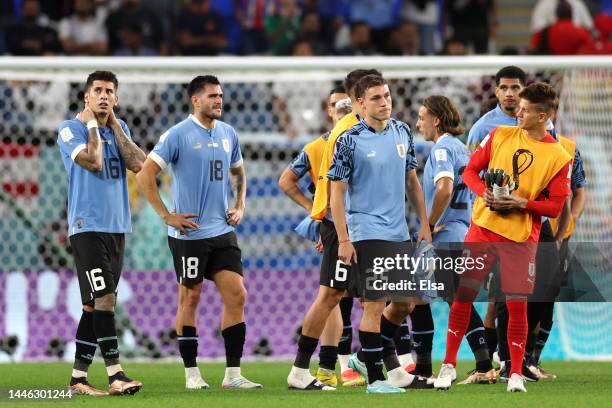 Manuel Ugarte of Uruguay look dejected after their sides' elimination from the tournament during the FIFA World Cup Qatar 2022 Group H match between...