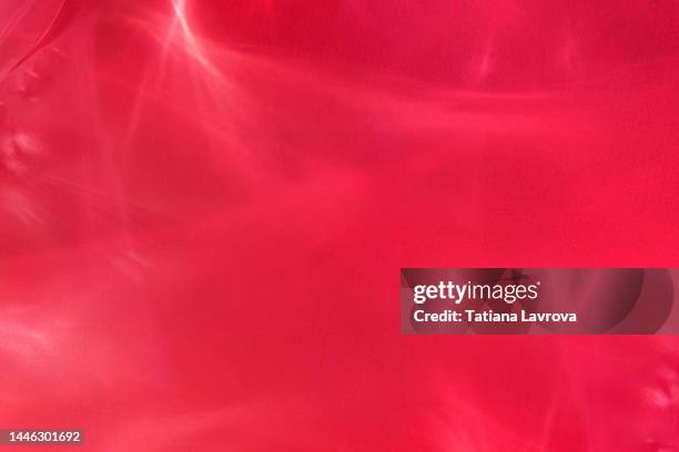 abstract magenta colored illuminated background. backdrop demonstrating trendy color of the year 2023 with copy space - two tone stock-fotos und bilder