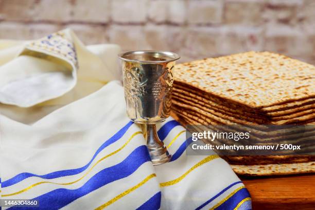 wine and matzoh jewish passover bread matzo - matzah stock pictures, royalty-free photos & images