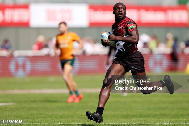 Billy Odhiambo of Kenya runs the ball for a try during the match between Australia and Kenya on day one of the HSBC World Rugby Sevens Series - Dubai...