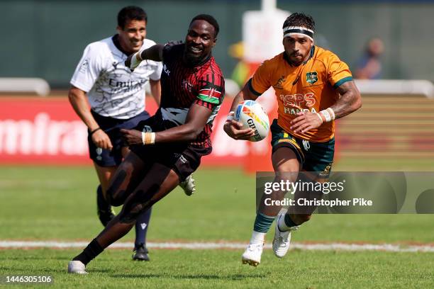 Maurice Longbottom of Australia runs the ball during the match between Australia and Kenya on day one of the HSBC World Rugby Sevens Series - Dubai...