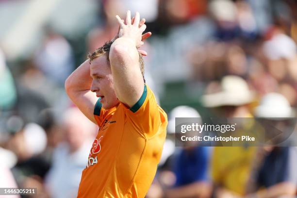 Henry Hutchison of Australia reacts during the match between Australia and Kenya on day one of the HSBC World Rugby Sevens Series - Dubai at The...