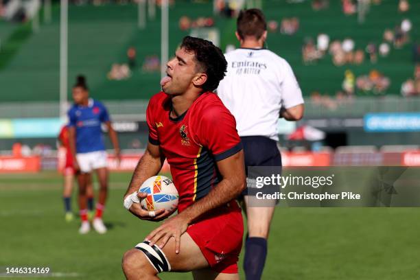 Manu Moreno of Spain reacts to scoring a try during the match between France and Spain on day one of the HSBC World Rugby Sevens Series - Dubai at...