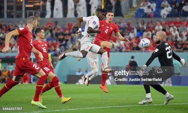 Vanja Milinkovic-Savic of Serbia makes a save the shot by Breel Embolo of Switzerland during the FIFA World Cup Qatar 2022 Group G match between...