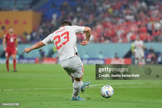 Xherdan Shaqiri of Switzerland scores the team's first goal during the FIFA World Cup Qatar 2022 Group G match between Serbia and Switzerland at...