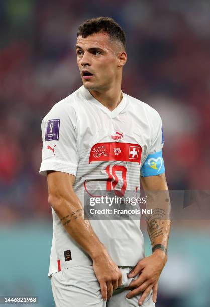 Granit Xhaka of Switzerland looks on during the FIFA World Cup Qatar 2022 Group G match between Serbia and Switzerland at Stadium 974 on December 02,...