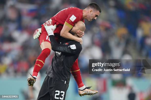 Dusan Vlahovic of Serbia celebrates after scoring the team’s second goal with teammate Vanja Milinkovic-Savic during the FIFA World Cup Qatar 2022...