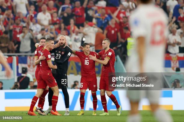 Dusan Vlahovic of Serbia celebrates with teammates after scoring the team's second goal during the FIFA World Cup Qatar 2022 Group G match between...