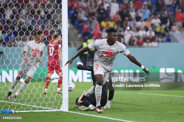 Breel Embolo of Switzerland celebrates after scoring the team's second goal during the FIFA World Cup Qatar 2022 Group G match between Serbia and...