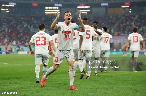 Granit Xhaka of Switzerland celebrates after the third goal by Remo Freuler during the FIFA World Cup Qatar 2022 Group G match between Serbia and...