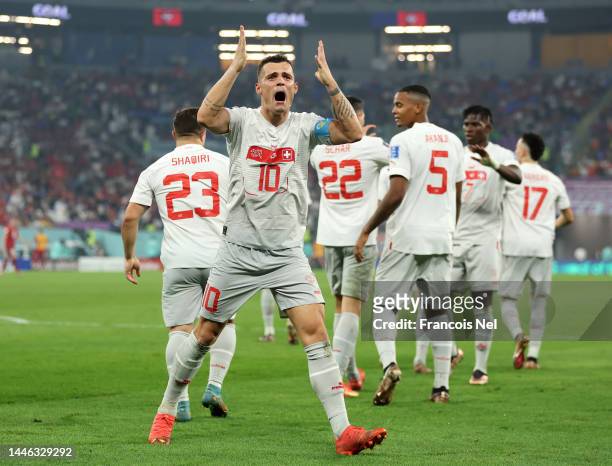 Granit Xhaka of Switzerland celebrates after the third goal by Remo Freuler during the FIFA World Cup Qatar 2022 Group G match between Serbia and...